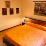 dormitorio-cabaña-Monte San Juan-las-calles